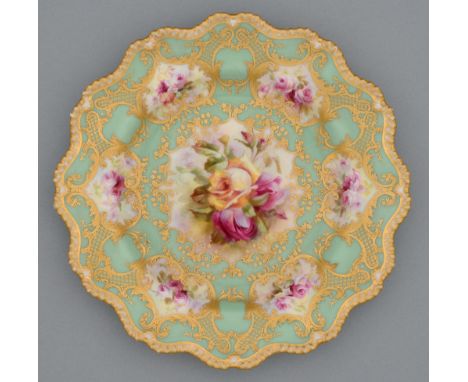 A Royal Worcester plate, c1917, painted by Roberts, signed, with two or three pink and yellow roses in raised gilt reserves o