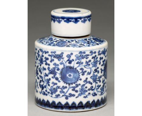 A Chinese blue and white tea caddy and cover, 19th / 20th c, painted with lotus meander, 12.5cm h Crack in unglazed neck and 