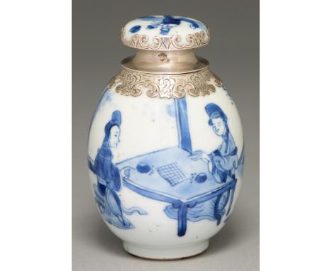 A Chinese blue and white tea caddy, 18th c, painted with two ladies playing go, later silver mount and silver mounted porcela