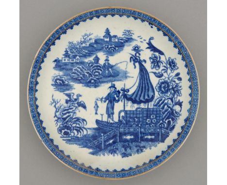 A Worcester blue and white saucer dish, c1790, transfer printed with the Fisherman pattern, 20.5cm diam, hatched crescent in 