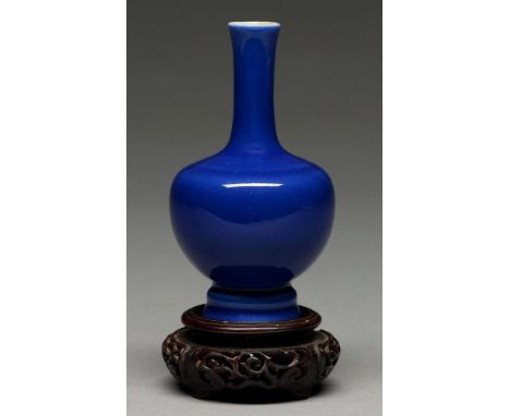 A Chinese blue monochrome glazed vase, possibly 19th c, with bulbous body and slightly waisted neck covered in an even blue g