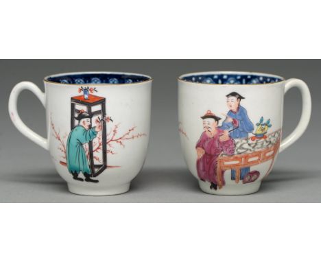 Two Worcester coffee cups, c1765, with underglaze blue border and painted with three Chinese figures, 66 and 67mm h One cup w
