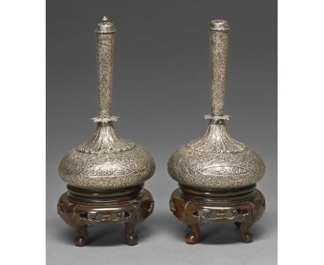 Two Mughal silver flasks and stoppers, North India or Kashmir, 18th / early 19th c, with compressed bulb, slightly flared nec