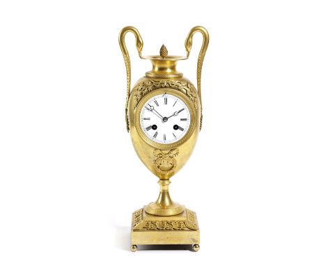 A FRENCH 'EMPIRE' ORMOLU URN MANTEL CLOCK EARLY 19TH CENTURY the brass eight day drum movement with an outside countwheel, st