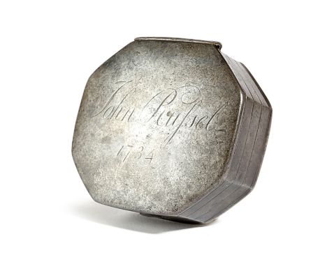 A GEORGE II STEEL SNUFF BOX DATED '1734' of octagonal form, the hinged lid inscribed 'John Russet 1734', the underside of the
