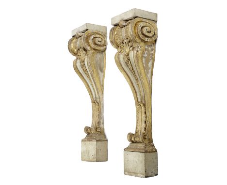 A PAIR OF ITALIAN PAINTED AND PARCEL GILT ARCHITECTURAL PEDESTALS 18TH CENTURY of scroll form (2) 112.8cm high, 34cm wide