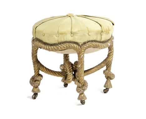 A NAPOLEON III FRENCH GILTWOOD STOOL AFTER A DESIGN  BY FOURNIER, THIRD QUARTER 19TH CENTURY the later button upholstered sea