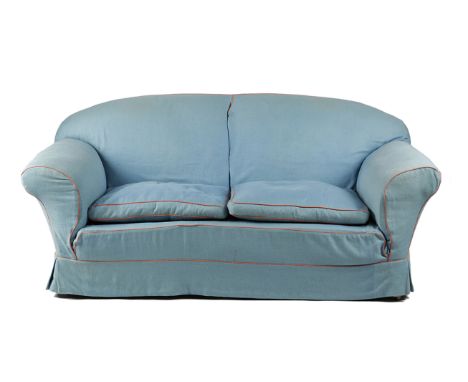 TWO SOFAS EARLY 20TH CENTURY AND LATER each with loose covers, one on square tapering front legs and on ceramic castors, the 