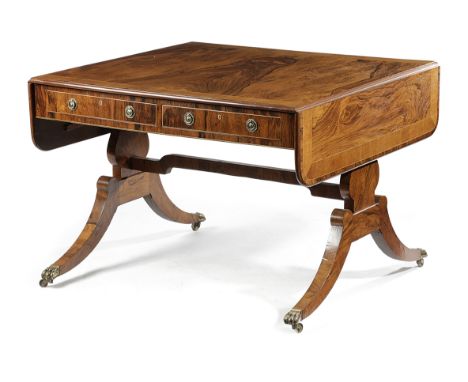 &nbsp;λ&nbsp;&nbsp;A REGENCY ROSEWOOD SOFA TABLE EARLY 19TH CENTURY the drop-leaf top with satinwood banding, above a pair of