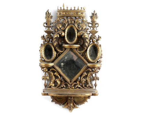 AN ITALIAN GILTWOOD MIRRORED WALL BRACKET LATE 19TH / EARLY 20TH CENTURY carved with scrolling leaves, with a crown surmount 
