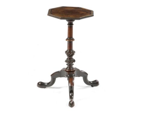 A GEORGE II MAHOGANY KETTLE STAND C.1750 the hexagonal fixed top with a moulded edge, originally with a gallery, on a ring an