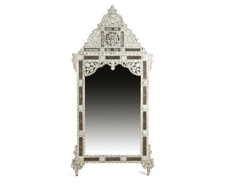 A LARGE MOORISH MOTHER OF PEARL AND BONE WALL MIRROR PROBABLY DAMASCUS, LATE 19TH / EARLY 20TH CENTURY with turned spindle pa