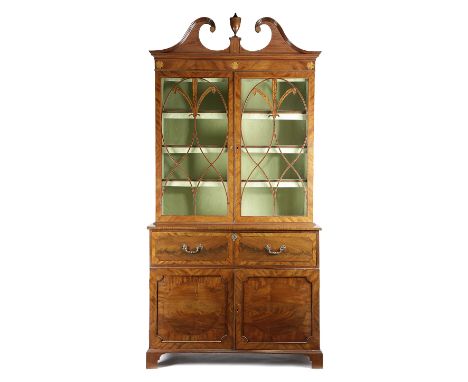 A GEORGE III MAHOGANY SECRETAIRE BOOKCASE C.1790 inlaid with boxwood stringing, the detachable cornice with a broken swan nec