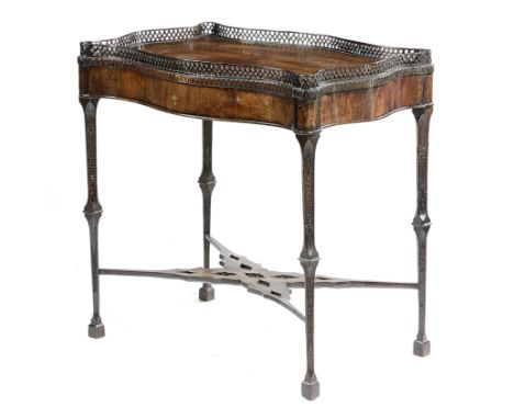 A GEORGE III MAHOGANY SILVER TABLE IN THE MANNER OF THOMAS CHIPPENDALE, C.1760-70 the serpentine top with a pierced gallery, 