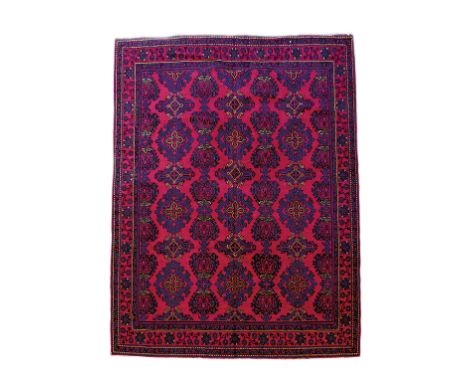 A TURKISH STYLE CARPET POSSIBLY DONEGAL, EARLY 20TH CENTURY 452 x 394cm