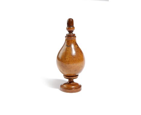 A TREEN BOXWOOD SPICE FLASK 18TH CENTURY in three sections, with an acorn finial, above a globular body and a turned foot 14.