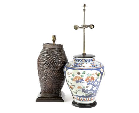 A JAPANESE PORCELAIN VASE TABLE LAMP LATE 17TH / EARLY 18TH CENTURY with a twin-light fitting, together with a rattan table l