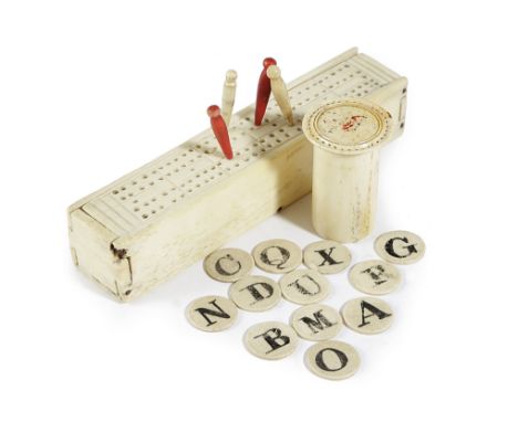 A BONE PART SPELLING ALPHABET EARLY 19TH CENTURY with twelve single sided letters in a cylindrical box, together with a Priso