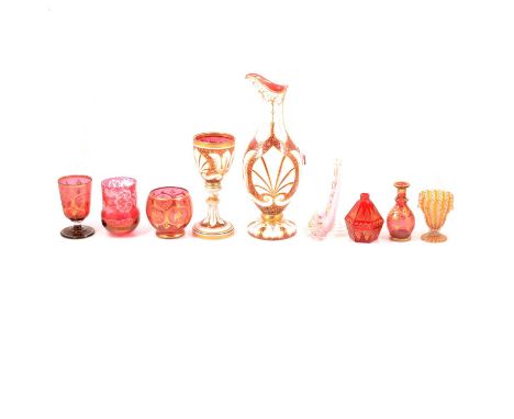 Venetian amber tinted beaker; Victorian ruby glass scent bottle; ruby glass gilt overlaid scent bottle; two other items of gi