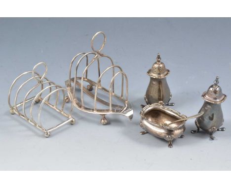Small silver toast rack, William Hutton &amp; Sons, Sheffield 1915, 12cm; another small toast rack; pair of pepperettes; and 