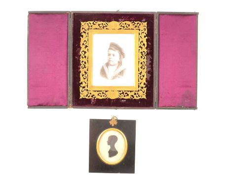 Victorian half plate photographic portrait in a fretted gilt metal frame (cracked), within a Morocco folding case, 24x21cm, a