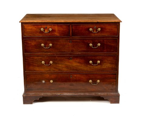 An early 19th Century mahogany chest of three long and two short drawers on bracket feet, 102cm wide