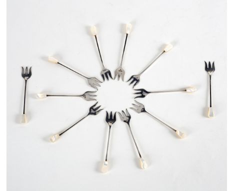 Twelve silver pickle forks, EV, Sheffield 1936, with mother-of-pearl bead finials