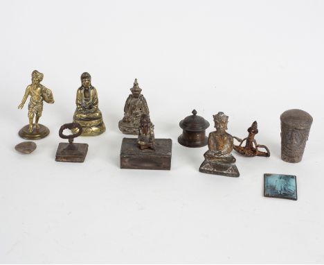 An embossed walking stick mount and various brass and other Indian figures
