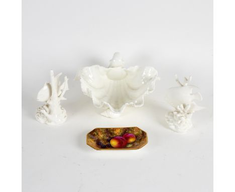 A Royal Worcester dish of shell form on three shell feet, 18.5cm wide, a model of a spade fish, a blue angel fish and a Royal