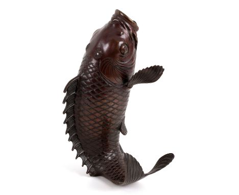 A Japanese bronze model of a leaping fish, Meiji period, signed under, 29cm high/see illustration CONDITION REPORT: Solder ma