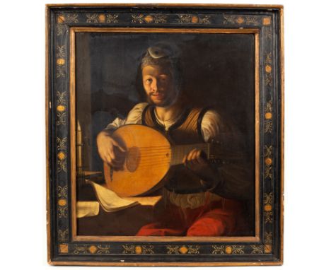 17th Century Roman School/Young Man Playing a Lute by Candlelight/oil on canvas, 71cm x 62cm/Provenance: The Arcade Gallery, 