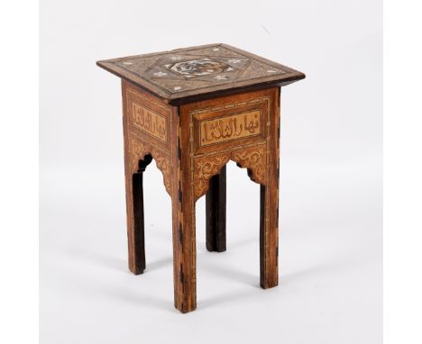 A small Moorish table inlaid with mother-of-pearl and panels of script, 29.5cm wide