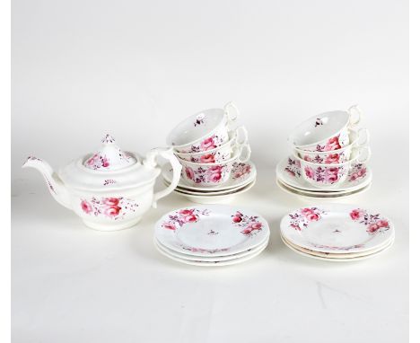 A mid 19th Century English porcelain tea service, decorated pink and puce roses, comprising teapot, six cups, six saucers and