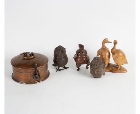 A Balinese carving of two geese, signed K T Djam Prah, 18cm high, a Chinese censer, a bronze bird, a Buddha head and an India