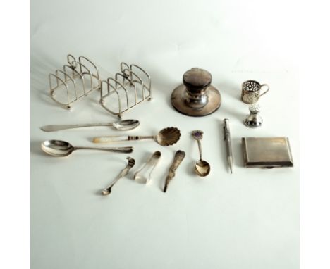 A pair of silver five-bar toast racks, JBC &amp; Sons Ltd., Birmingham 1929, an engine turned cigarette case and various silv