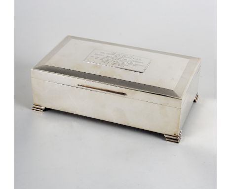 A silver cigar box, Thomas Fattorini Ltd., Birmingham 1975, with engine turned decoration and presentation description to Mr 