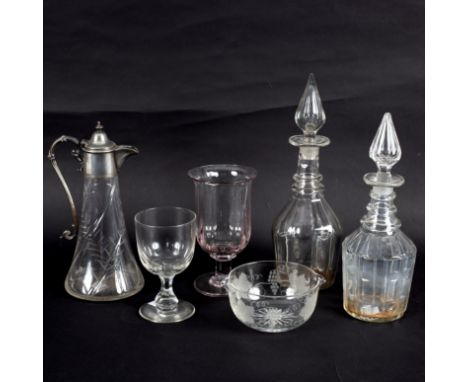 A group of 19th Century and later glass to include a plate mounted claret jug, two decanters, a celery vase, a rummer and fin