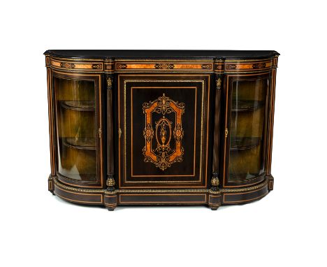 A Victorian D-shaped ebonised and ebony side cabinet with decorative inlaid frieze, narrow banding and gilt metal mouldings, 