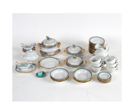 A child's tea service with turquoise and gilt rims, a plain service and a miniature cup and saucer/Provenance: The Estate of 