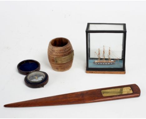 A treen barrel made from the teak of HMS Iron Duke, Admiral Jellicoe's Flag Ship Jutland 1916, a letter knife with presentati
