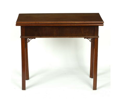 A Chippendale period mahogany tea or card table, raised on square chamfered legs with pierced corner brackets, 87.5cm wide