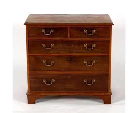 A George III mahogany chest of two short over three long drawers on bracket feet, 82cm wide