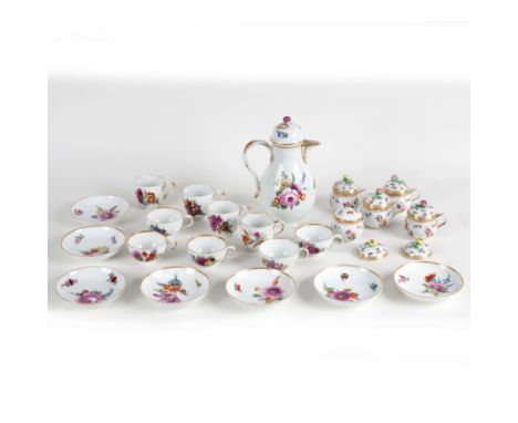 A Meissen Marcolini part tea and coffee service, comprising coffee pot and cover, five teacups, four coffee cups, and seven s