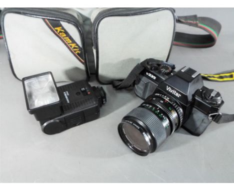Vivitar v335 camera with Hanimex 325AZ flash unit and manual in soft case