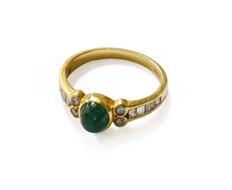 An 18 Carat Gold Emerald and Diamond Ring, finger size NThe ring is in poor condition, surface abrasion/chips to the emerald,