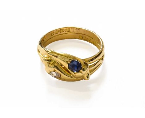 An 18 Carat Gold Sapphire and Diamond Snake Motif Ring, the serpent heads with inset with an old cut diamond and a round cut 