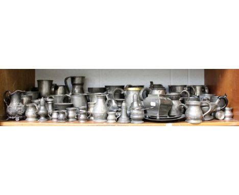 A Collection of 18th Century and Later Pewter, mainly hollow wares including tankards, jugs, measures, pepperettes a shaving 
