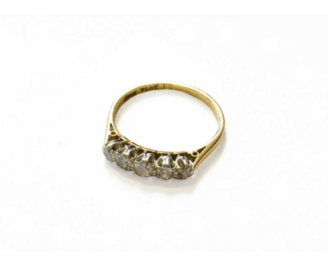 A Diamond Five Stone Ring, stamped '18CT' and 'PLAT', finger size PGross weight 2.9 grams.