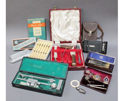Two Silver-Gilt RAOB Jewels,  A Plated and Ivorine Soldier Teething Ring/Rattle, Two Telescopic Pencils, A Cased Set of Cut T