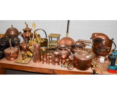 A Collection of Victorian Copper and Brassware, including kettles, tea urns, fire tools, coal helmet, candlestick, and pans, 